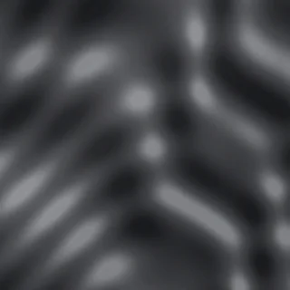 Charcoal #124 metallic swatch: deep smoky charcoal with darker black-gray swirls and a soft pearl sheen