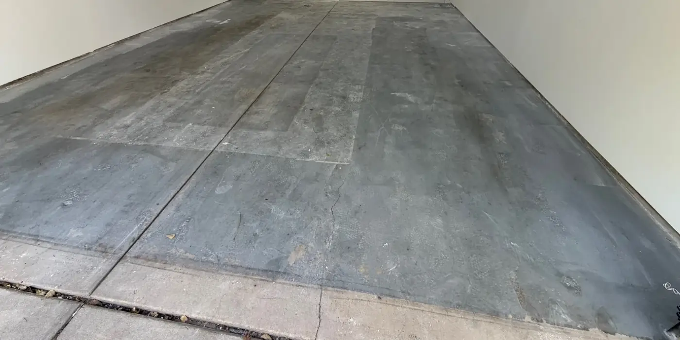 Before: two-car garage floor